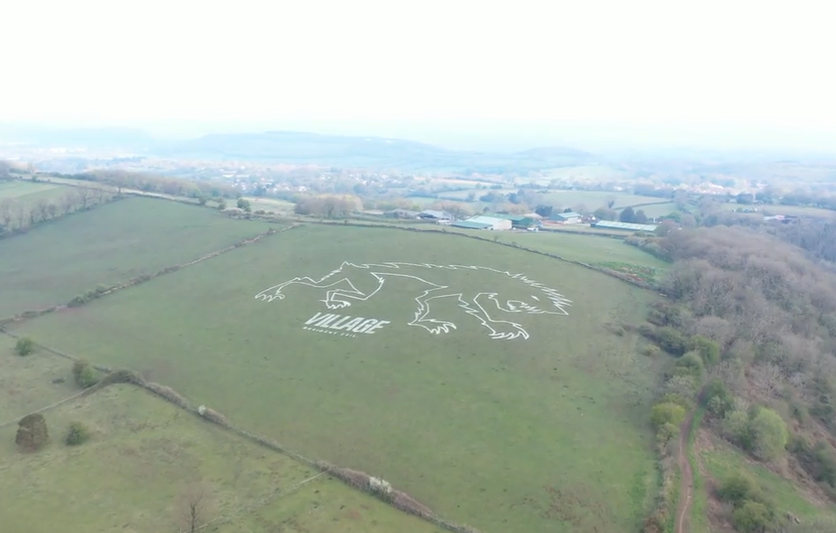 Capcom Celebrates Resident Evil Village’s Launch By Drawing A Giant Hillside Lycan