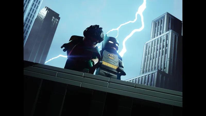 Batman and Robin pose on a rooftop in a shot reminiscent of the intro to Batman: The Animated Series.