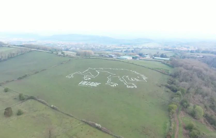 Capcom Celebrates Resident Evil Village’s Launch By Drawing A Giant Hillside Lycan